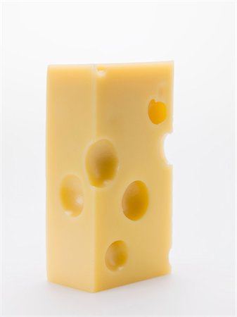 Piece of Emmental cheese Stock Photo - Premium Royalty-Free, Code: 659-03530655