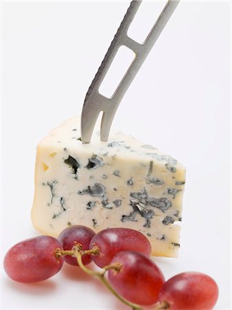 red grape - Piece of blue cheese with cheese knife and red grapes Stock Photo - Premium Royalty-Free, Code: 659-03530743