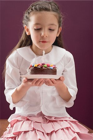 sweet melon - Little girl holding birthday cake Stock Photo - Premium Royalty-Free, Code: 659-03530980