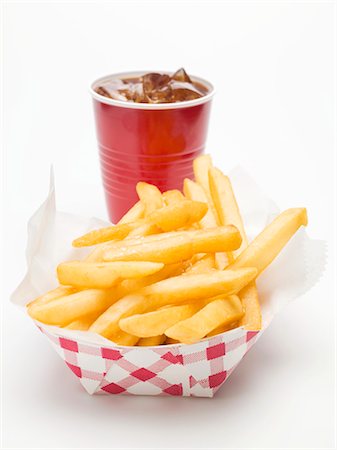 simsearch:659-03531074,k - A cola and a portion of chips Stock Photo - Premium Royalty-Free, Code: 659-03531075