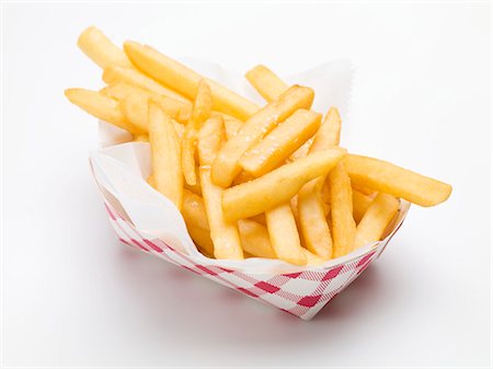 frite (aliment) - Une portion de frites dans un plat de papier (fast food) Photographie de stock - Premium Libres de Droits, Code: 659-03531073