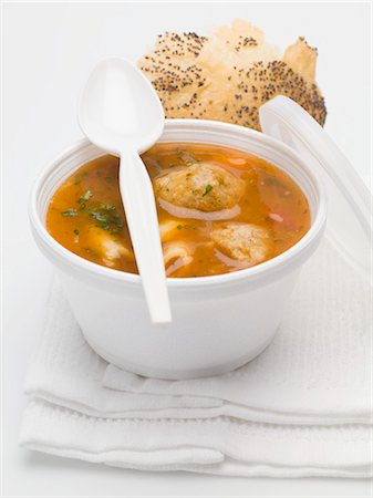 Goulash soup with small dumplings in a plastic tub Stock Photo - Premium Royalty-Free, Code: 659-03531102