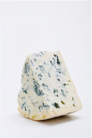 A piece of blue cheese Stock Photo - Premium Royalty-Free, Code: 659-03531117