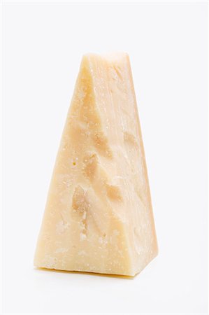 A piece of Parmesan cheese Stock Photo - Premium Royalty-Free, Code: 659-03531126