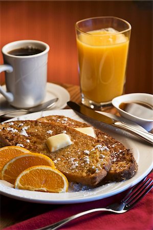 French Toast Breakfast with Oranges; Juice and Coffee Stock Photo - Premium Royalty-Free, Code: 659-03531190