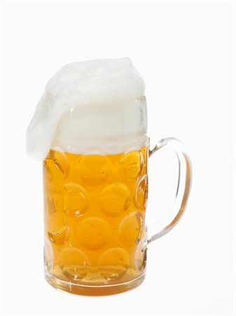 espuma - Beer in litre tankard with overflowing foam Foto de stock - Sin royalties Premium, Código: 659-03531294