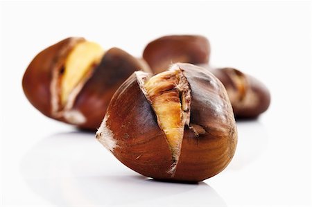 sweet chestnut - Sweet chestnuts, roasted (close-up) Stock Photo - Premium Royalty-Free, Code: 659-03531537