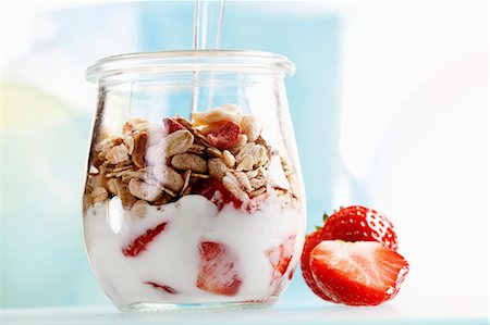 strawberry in yogurt - Yoghurt with muesli and strawberries Stock Photo - Premium Royalty-Free, Code: 659-03531558