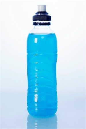 Gold Water bottle on blue stock photo. Image of thirst - 11053494