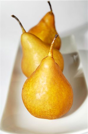 pera - Three pears Foto de stock - Sin royalties Premium, Código: 659-03531660