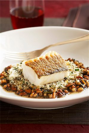 Baked Cod over Beans Stock Photo - Premium Royalty-Free, Code: 659-03531922