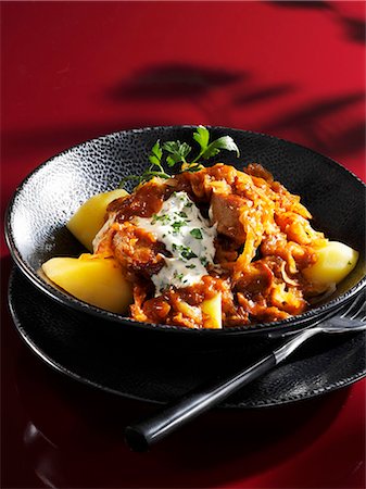 Szeged turkey goulash on potatoes Stock Photo - Premium Royalty-Free, Code: 659-03532046