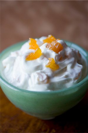 Bowl of Greek Yogurt with Apricot Stock Photo - Premium Royalty-Free, Code: 659-03532056