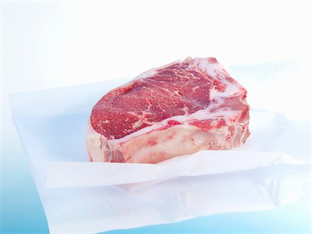 Ribeye steak on paper Stock Photo - Premium Royalty-Free, Code: 659-03532121