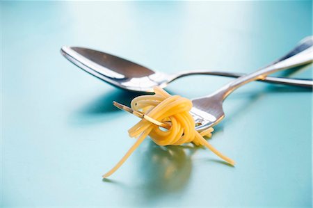 pasta and fork - Spoon and fork with spaghetti Stock Photo - Premium Royalty-Free, Code: 659-03532148