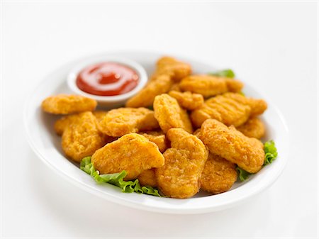 simple dish - Chicken nuggets Stock Photo - Premium Royalty-Free, Code: 659-03532276