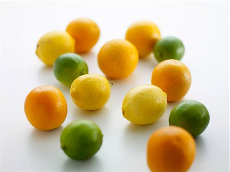 fruit still life - Lemons, limes and oranges Foto de stock - Sin royalties Premium, Código: 659-03532297