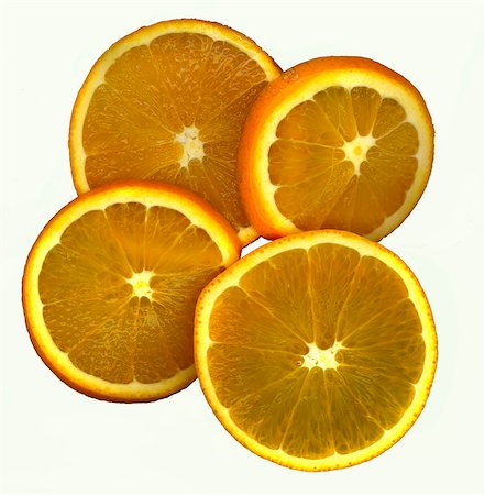 Four slices of orange Stock Photo - Premium Royalty-Free, Code: 659-03532308