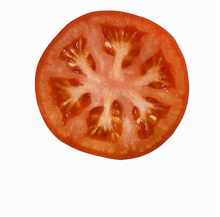 simsearch:659-01845551,k - Tranche de tomate sur fond blanc Photographie de stock - Premium Libres de Droits, Code: 659-03532491