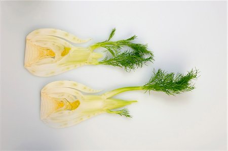 Two slices of fennel with leaves Stock Photo - Premium Royalty-Free, Code: 659-03532552