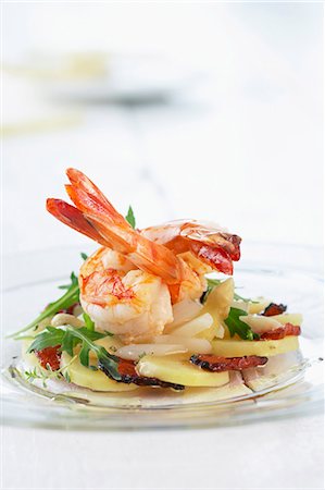 recipe of crustacean - Fried prawns on potato, asparagus and ham salad Stock Photo - Premium Royalty-Free, Code: 659-03532572