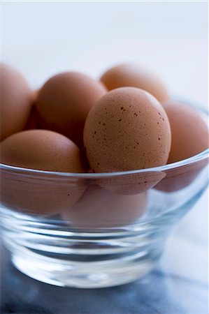 eggs in bowl - Glass Bowl of Organic Brown Eggs Stock Photo - Premium Royalty-Free, Code: 659-03532675