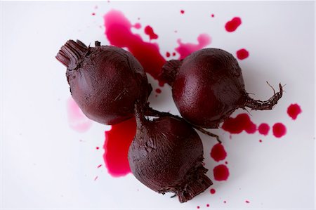 Three Whole Roasted Beets on White Stock Photo - Premium Royalty-Free, Code: 659-03532680