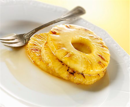 picture of pineapple - Fried pineapple slices with honey Foto de stock - Sin royalties Premium, Código: 659-03532838