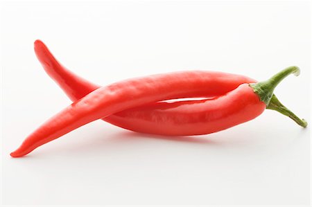 Two red chillies Stock Photo - Premium Royalty-Free, Code: 659-03532855