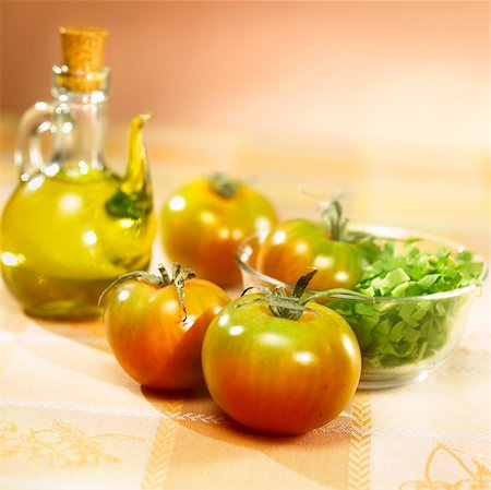 Tomatoes, lettuce and olive oil Stock Photo - Premium Royalty-Free, Code: 659-03533018