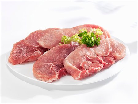 rumpsteak - Pork leg steaks Stock Photo - Premium Royalty-Free, Code: 659-03533252