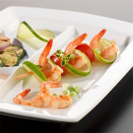 shrimp and fruit - Prawn, lime and tomato skewer Stock Photo - Premium Royalty-Free, Code: 659-03533265