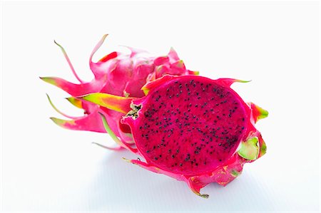 simsearch:659-03534657,k - Pink-fleshed dragon fruit, whole fruit and a half Stock Photo - Premium Royalty-Free, Code: 659-03533520