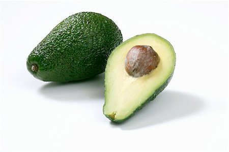 Avocado and half an avocado Stock Photo - Premium Royalty-Free, Code: 659-03533605