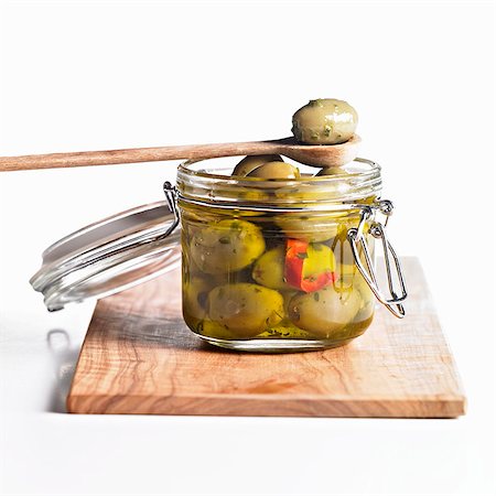 pickled - Green olives in preserving jar Stock Photo - Premium Royalty-Free, Code: 659-03533880