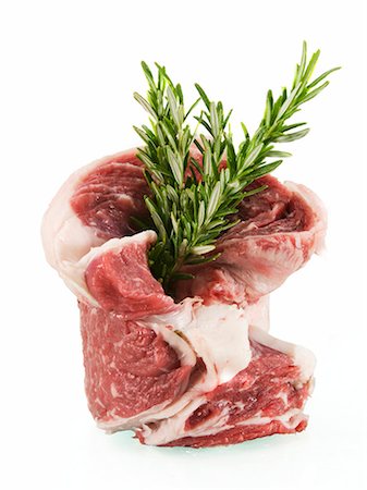 simsearch:659-01867471,k - Raw Beef Rib Steak with Fresh Rosemary Foto de stock - Royalty Free Premium, Número: 659-03533908