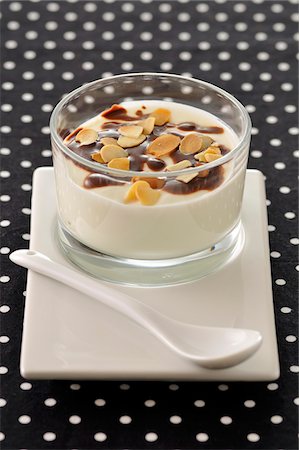 desserts with fruit sauces - Almond milk panacotta with chocolate sauce Stock Photo - Premium Royalty-Free, Code: 652-05806785