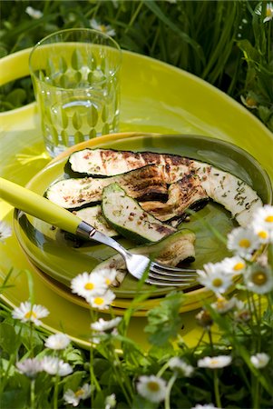 simsearch:825-07522905,k - Plate of grilled zucchinis on a tray outdoors Stock Photo - Premium Royalty-Free, Code: 652-05806954