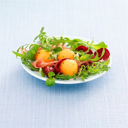 roquette - Salade de melon et de charcuterie Photographie de stock - Premium Libres de Droits, Code: 652-05807179