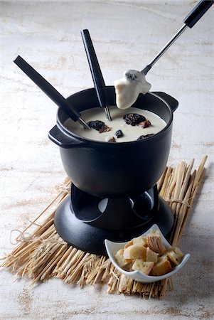 fondue (mets) - Fondue savoyarde Photographie de stock - Premium Libres de Droits, Code: 652-05807288
