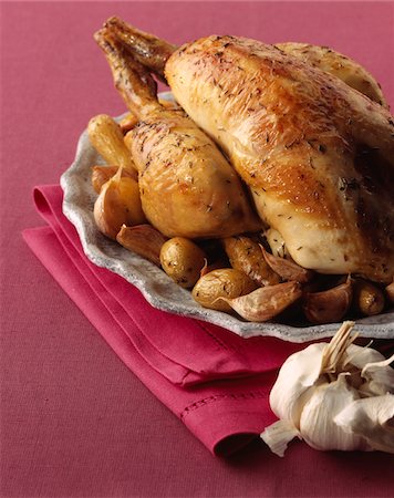 simsearch:652-03804390,k - Poulet rôti à l'ail Photographie de stock - Premium Libres de Droits, Code: 652-05807378