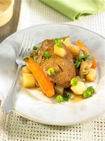 Seitan with spring vegetables Stock Photo - Premium Royalty-Free, Code: 652-05807800