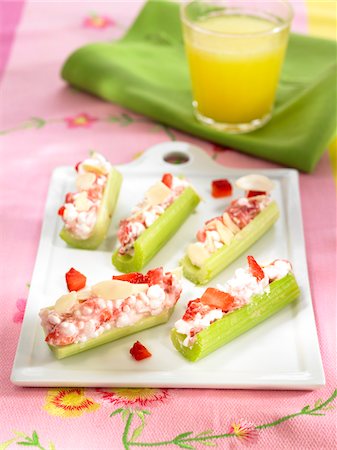 simsearch:652-03802105,k - Celey stalks filled with strawberry and almond cream Stock Photo - Premium Royalty-Free, Code: 652-05807831