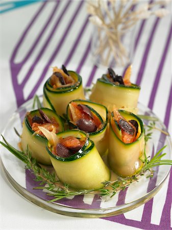 simsearch:652-07656411,k - Zucchini rolls stuffed with chopped tomatoes and olives Stock Photo - Premium Royalty-Free, Code: 652-05807873