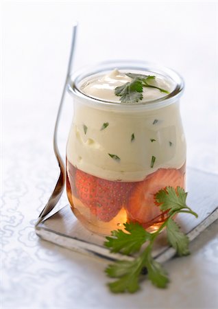 Strawberries in jelly with yoghurt and coriander Stock Photo - Premium Royalty-Free, Code: 652-05808210