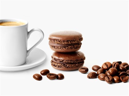 simsearch:652-03802994,k - Chocolate macaroons,coffee beans and a cup of coffee Stock Photo - Premium Royalty-Free, Code: 652-05808234