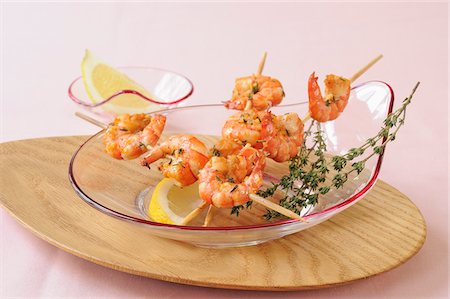 simsearch:652-01666717,k - Shrimp brochettes with thyme,garlic and lemon Stock Photo - Premium Royalty-Free, Code: 652-05808269