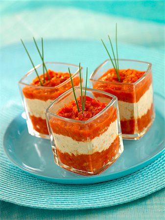 simsearch:825-06816514,k - Red pepper puree and potted sardines mixed with fresh goat's cheese Fotografie stock - Premium Royalty-Free, Codice: 652-05808532