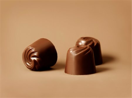 simsearch:652-05808898,k - Three chocolates Stock Photo - Premium Royalty-Free, Code: 652-05808888