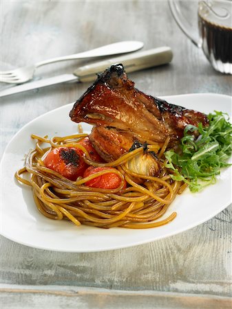 simsearch:652-06818673,k - Caramelized spaghetti and shoulder of lamb with honey and tomatoes Stock Photo - Premium Royalty-Free, Code: 652-05809150